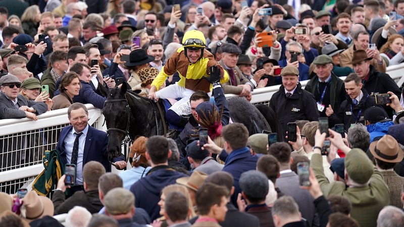 Jockey Paul Townend and Galopin Des Champs make their way back in after winning the Boodles Cheltenham Gold Cup Chase.