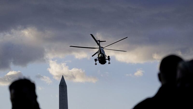 The presidential helicopter Marine One departs the White House with Donald Trump on board for the last time as 45th US president on Wednesday. Picture by Alex Brandon/AP