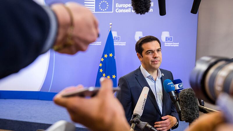 <span style="font-family: Verdana, Arial, Helvetica, sans-serif; font-size: 13.3333330154419px;">Greek Prime Minister Alexis Tsipras speaks with the media after a meeting of eurozone heads of state at the EU Council building in Brussels on Monday, July 13, 2015</span>