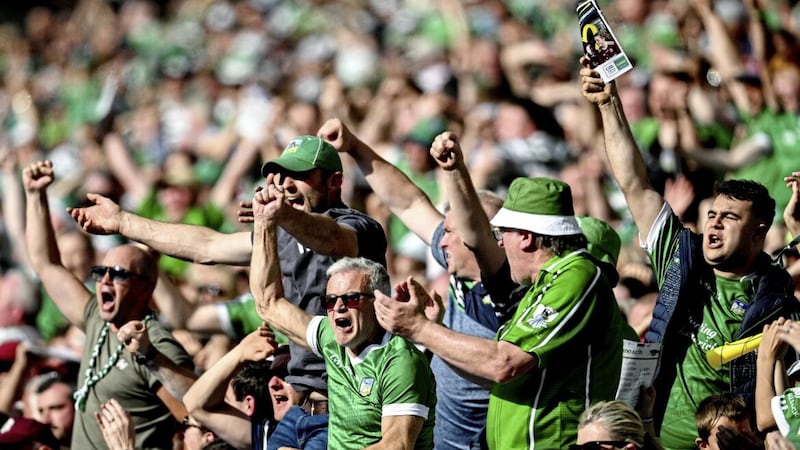 Jubilant Limerick supporters during Sunday&#39;s All-Ireland Hurling Senior Championship semi-final against Galway in Croke Park. Around 120,000 supporters packed into the stadium over the weekend. Photo by Ramsey Cardy/Sportsfile 
