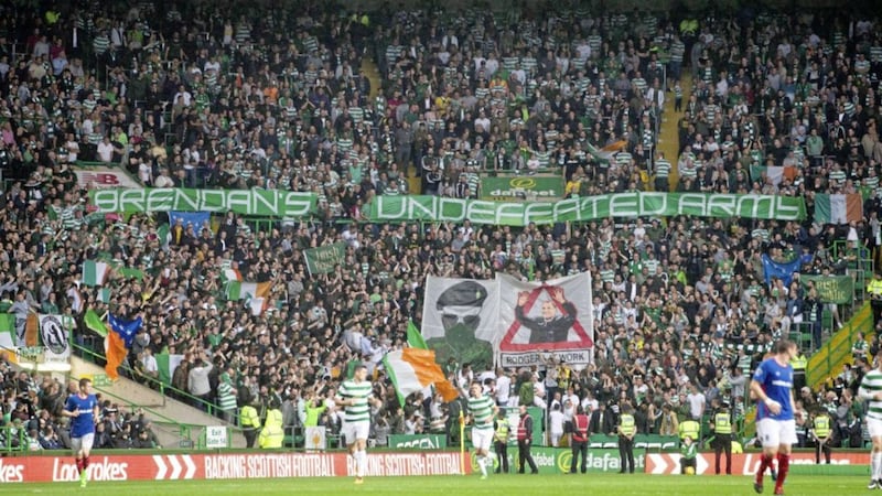 Celtic have been hit with UEFA disciplinary action over a banner &quot;portraying a person in a paramilitary uniform&quot; during their Champions League victory over Linfield at Celtic Park last week. Picture by Jeff Holmes, PA Wire 
