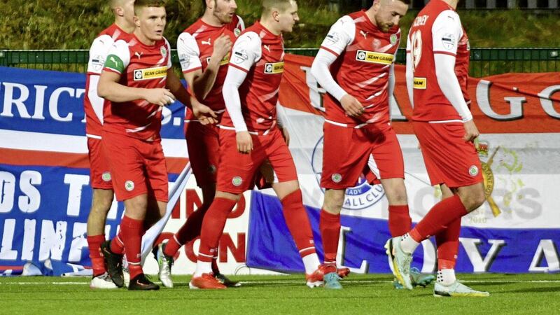 Cliftonville players celebrate after Ronan Doherty scored what proved to be the only goal of the game against Linfield at Solitude on Tuesday January 10. 