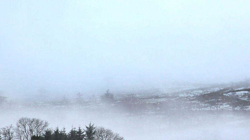 The scene as viewed across Co Derry from the Glenshane Pass after heavy snow fall and freezing fog  