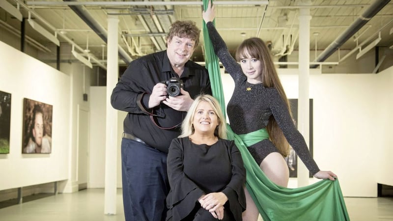 Mervyn Smyth of Belfast Exposed and aerialist Hannah Anderson with Gilly Campbell of the Arts Council of Northern Ireland 