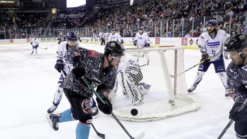 Belfast Giants&#39; Darcy Murphy with Milton Keynes Lightning&#39;s Adam Goss during an Elite Ice Hockey League game at the SSE Arena, Belfast on December 28 2018. Picture by William Cherry/Presseye 