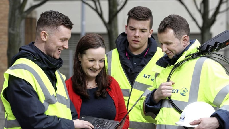 Mairead Meyer from BT in Northern Ireland with local networks apprentices Jonny Hunter and Matthew Morrow and recent apprentice Scott Gilmore (centre). Picture: William Cherry/Press Eye 