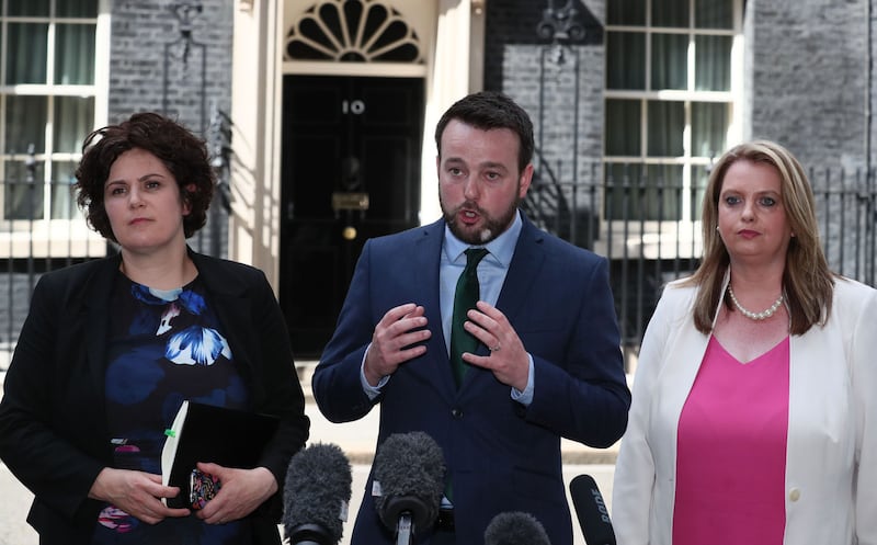 Colum Eastwood (centre) and other members of the Social Democratic and Labour Party (SDLP) after talks at 10 Downing Street, London. Picture from Gareth Fuller/PA Wire.