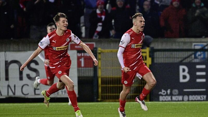 Cliftonville&rsquo;s Rory Hale (right) celebrates what turned out to the winning goal against Larne, pursued by Sean Moore at Solitude yesterday 