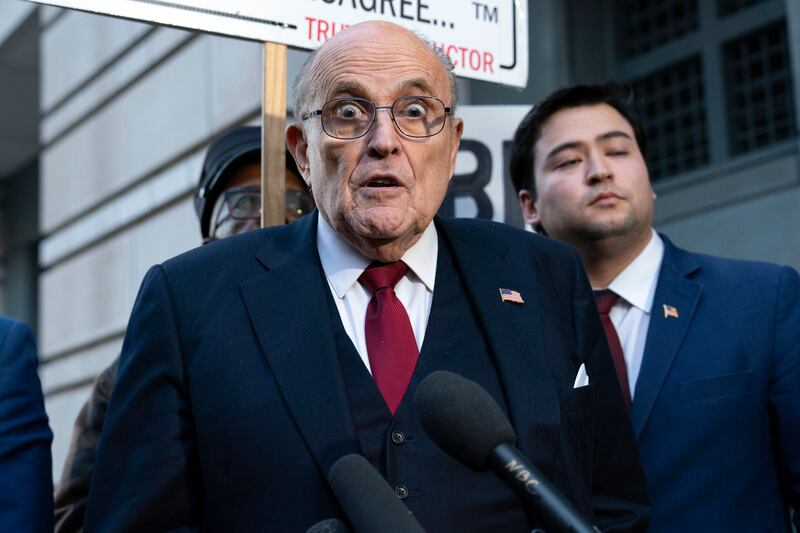 Rudy Giuliani speaks during a news conference outside court in Washington on Friday (Jose Luis Magana/AP)