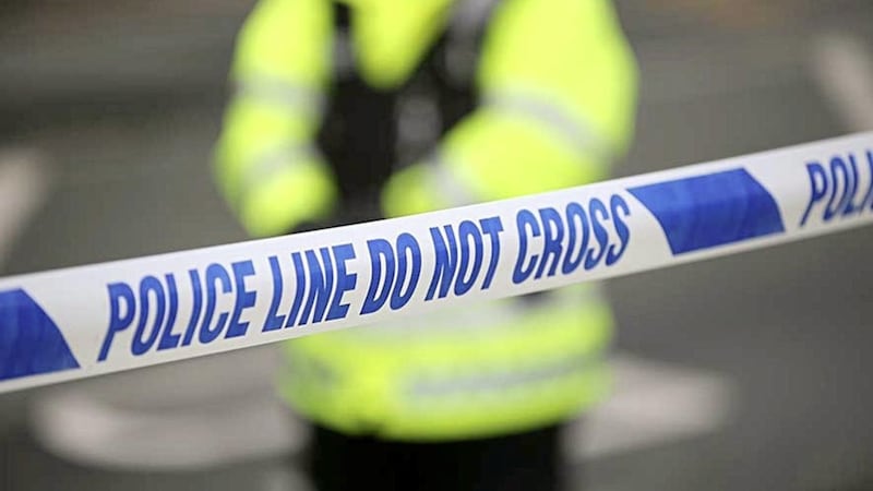 Police have said enquiries into a crash in west Belfast which involved a scrambler and a car were last night &quot;continuing&quot; 