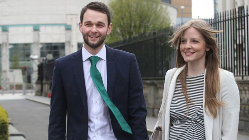 Daniel McArthur and his wife Amy arrive at court this morning. Photo: Hugh Russell