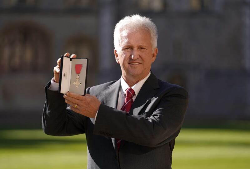 Louis Cayer after being made a MBE (Member of the Order of the British Empire) by the Princess Royal during an investiture ceremony at Windsor Castle