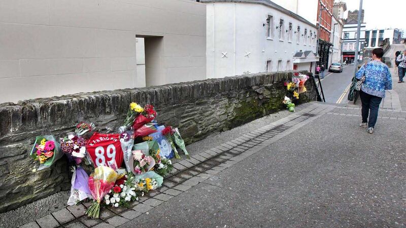Floral tributes left on the Derry walls where Conall Kerrigan's body was found in August 2015. Picture by Margaret McLaughlin &nbsp;&nbsp;
