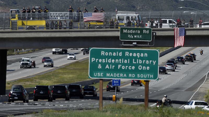 Firefighters salute as the hearse carrying the body of Nancy Reagan makes its way to the Ronald Reagan Presidential Library, in Simi Valley, California. Picture by Mark J&nbsp;Terrill, Associated Press&nbsp;