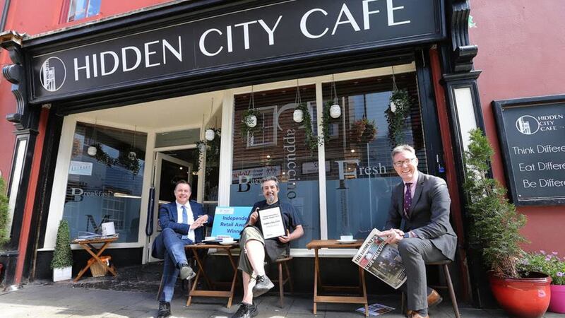 &nbsp;Hidden City Cafe - Gold Deli of the Year, Silver Coffee Shop of the Year, Bronze Overall Retailer of the Year<br />Justyn McNicholl of Hidden City Cafe pictured with Glyn Roberts, Retail NI and John Brolly, Irish News.