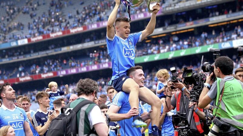 Eoin Murchan, the latest talent to come off the Dublin production line, holds up the Sam Maguire Cup. Picture Seamus Loughran. 
