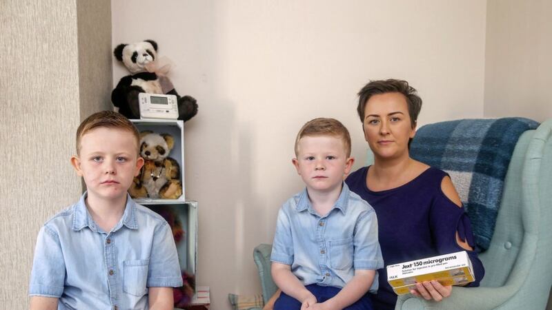 Belfast mother Roisin White with her two children Jonah and Jude who rely on EpiPens for their allergies. Picture Mal McCann. 