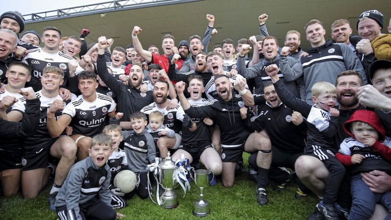 Jerome Johnston in the middle of the Kilcoo celebrations after Sunday&#39;s Down title win over Warrenpoint. Picture by Cliff Donaldson 