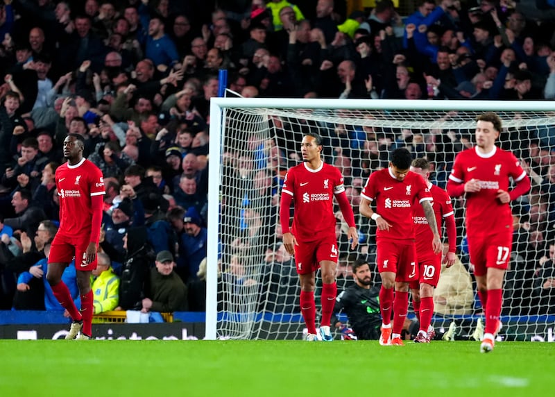 Liverpool’s title hopes were handed a massive blow after a Merseyside derby defeat to Everton