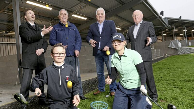 Colin Glen Chief Executive, Colin O&#39;Neill; Councillor Seanna Walsh; DAERA Leader and Rural Tourism Implementation Manager, Gareth Evans and David Raymond, Chairman of Colin Glen Trust with young golfers, Fionn Dobbin and Annabelle Wilson. Picture by Stephen Davison 