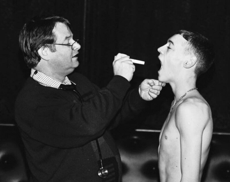 SAY AAGH!...Dr Sean Donnelly tries to shed some light on Gerard McManus at the weigh-ins for the 1997 Ulster Senior Championships