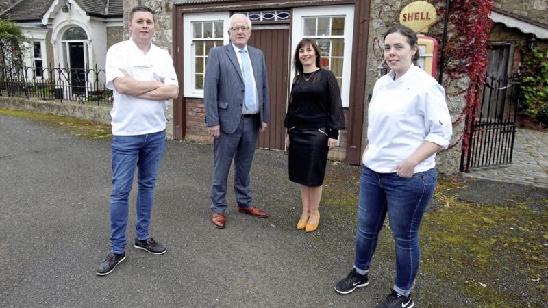 Stevie Higginson, Cristina Higginson and chef Danni Barry outside Clenaghans alongside Allan Ewart, chairman of Lisburn and Castlereagh City Council's development committee
