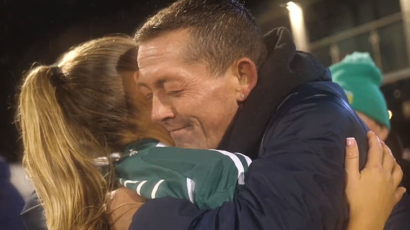 Danny Maxwell (right) embracing Danielle Maxwell (left) after Northern Ireland's draw against Hungary. 