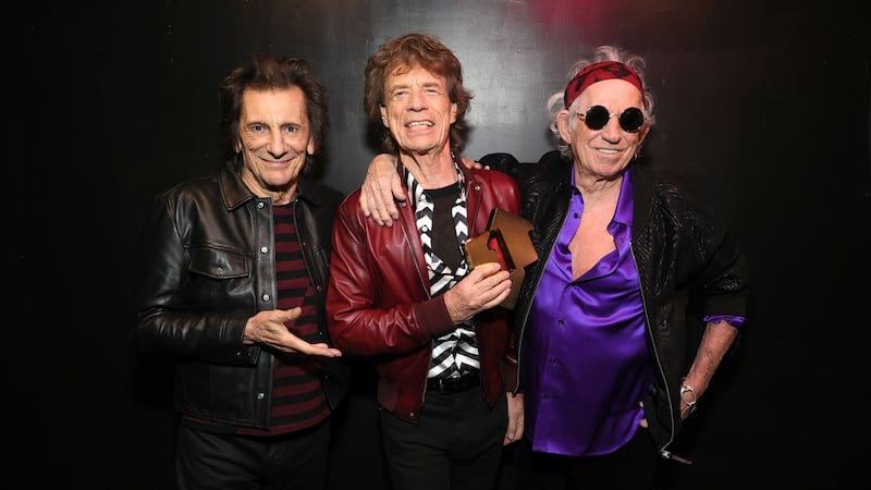 The Rolling Stones pose with their Official Number 1 Album Award to celebrate their Official Number 1 album with Hackney Diamonds (Kevin Mazur/Official Charts Company/PA)