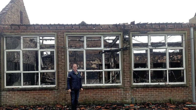 Sinn F&eacute;in councillor Terry Hearty at the site of the former Anamar Primary School which was damaged in a &#39;deliberate&#39; fire 