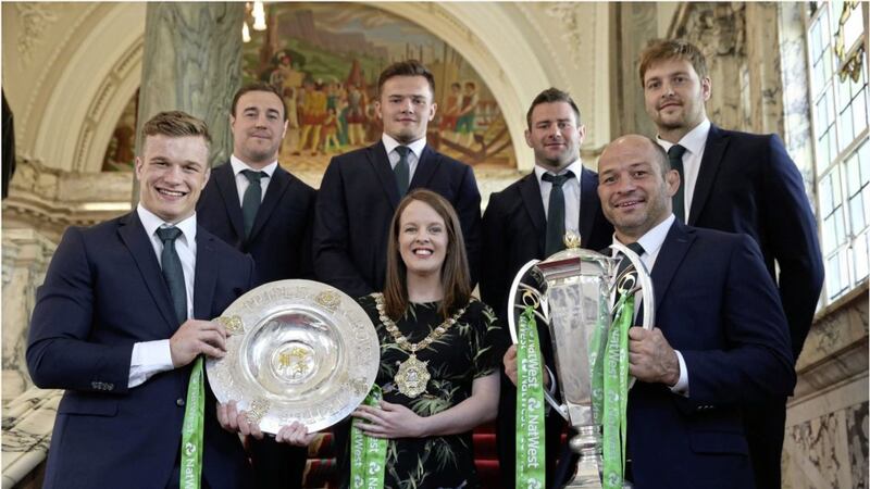 Belfast mayor Nuala McAllister with members of Ireland&#39;s grand slam-winning rugby squad. Picture by Hugh Russell 