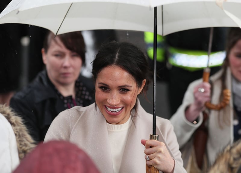 &nbsp;Meghan Markle greets well wishers on Great Victoria Street after enjoying lunch in the Crown Bar. Picture by Brian Lawless, PA