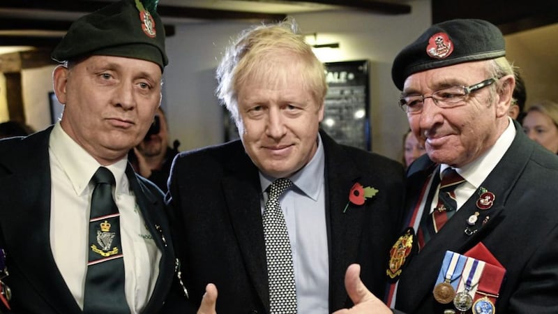 British prime minister Boris Johnson meets with military veterans at the Lych Gate Tavern in Wolverhampton. Picture by Stefan Rousseau/PA Wire 