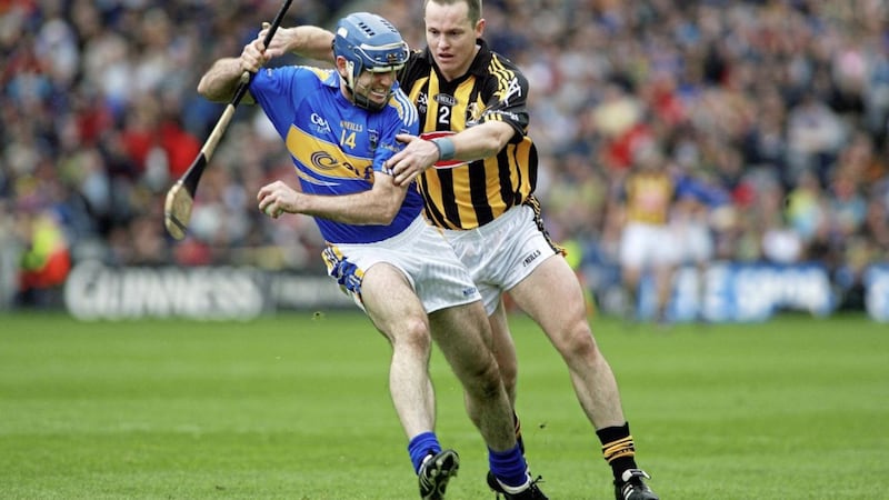 All&#39;s fair in love and war: Michael Kavanagh tangles with Eoin Kelly Pic:Seamus Loughran 