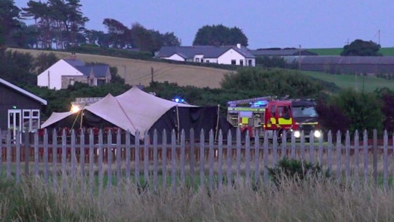 Grab from PA video of Police and emergency services attending Newtownards Airport in County Down, following a crash involving an aircraft. Picture date: Tuesday July 19, 2022.