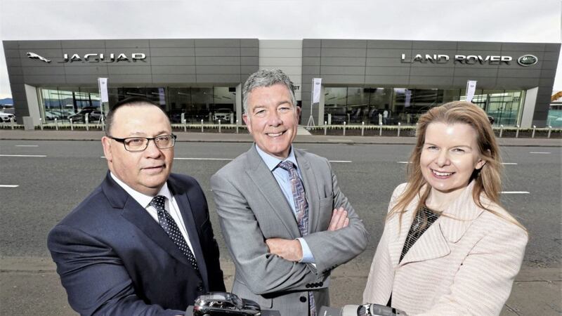 Pictured outside the new Charles Hurst Belfast showroom are (from from) newly appointed head of business Norman Fraser, head of operations Colin McNab and Christina Fickling, regional business manager for Jaguar Land Rover 