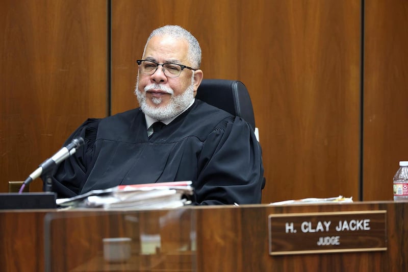 Judge H. Clay Jacke listens during trial