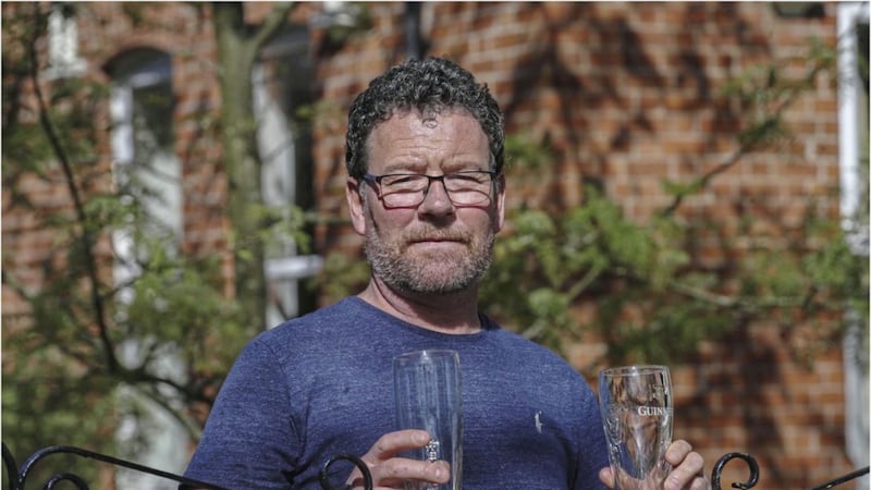 North Belfast customer Joe O&#39;Boyle had been `looking forward&#39; to his pint of Guinness courtesy of Hatfield House, when delivery service was shut down. Picture: by Hugh Russell 