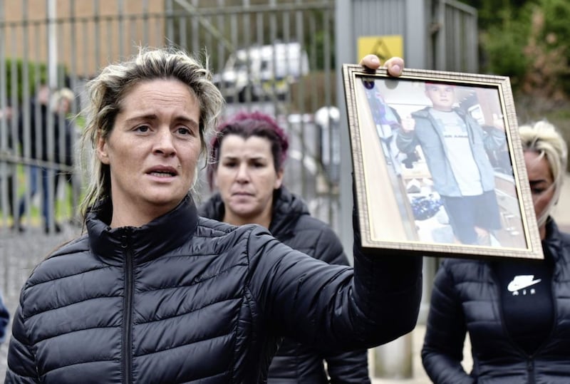 Ellie Ward holds up a picture of her husband Pat Ward outside Dungannon Magistrates court on Wednesday. Picture by Pacemaker&nbsp;