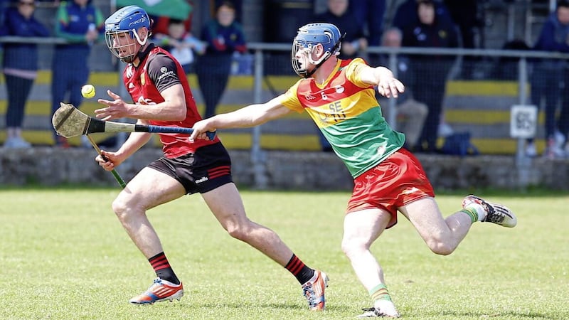 Down&#39;s Finn Turpin and Carlow&#39;s Diarmuid Byrne. Turpin hit five points from play for the Ardsmen Picture: Philip Walsh. 