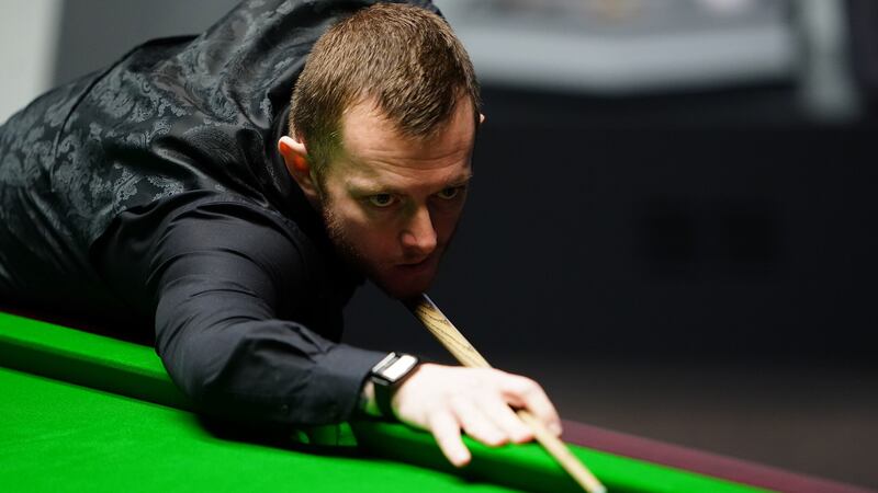 Mark Allen in action in the third session of his World Championship semi-final against Mark Selby