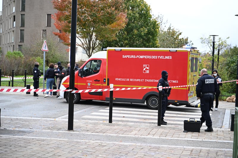 Police stand near a park after a shooting in Trappes, outside Paris (Emma Da Silva/AP)