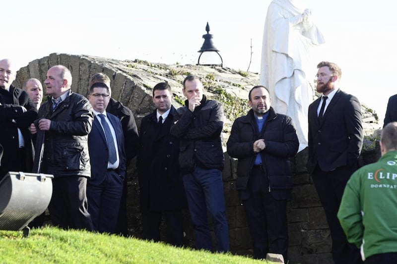 Mourners including Cliftonville  Chairman Gerard Lawlor, Linfield manager David Healy , former Cliftonville manager Tommy Breslin, former cliftonville player Ronan Scannell,  and Cliftonville player Conor Devlin,  at the funeral of former Cliftonville player Paul Straney in Downpatrick yesterday. Picture by Ann McManus. 