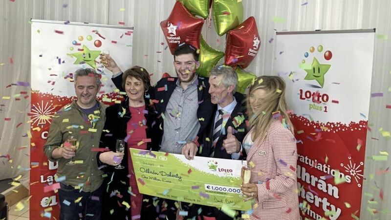 Odhr&aacute;n Doherty receives his lottery winnings in Dublin yesterday. Picture by RTE.  