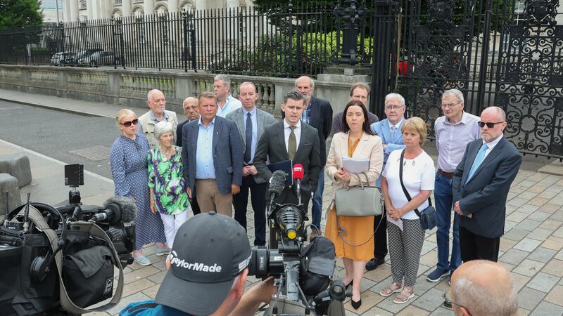 The Hooded Men and relatives outside the High Court in Belfast last month 