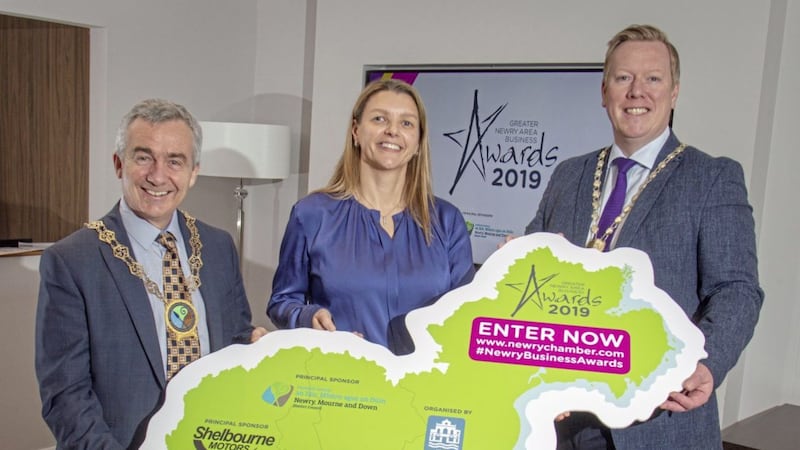 Newry Chamber president Paul Convery (right) with Councillor Mark Murnin and Caroline Willis representing principal sponsors Newry, Mourne and Down District Council and Shelbourne Motors respectively 
