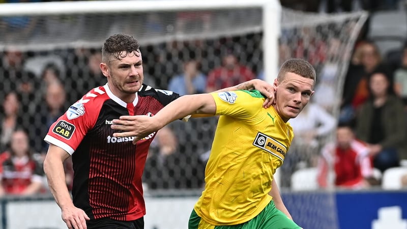 Levi Ives (right) made more than 200 appearances for Cliftonville before making the switch to Larne