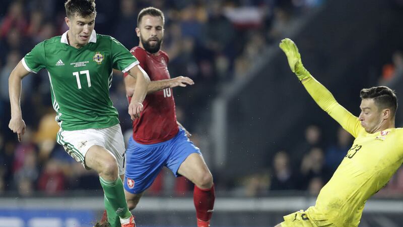 Paddy McNair rounds the Czech Republic keeper to score during a dream first-half for Northern Ireland in Prague.