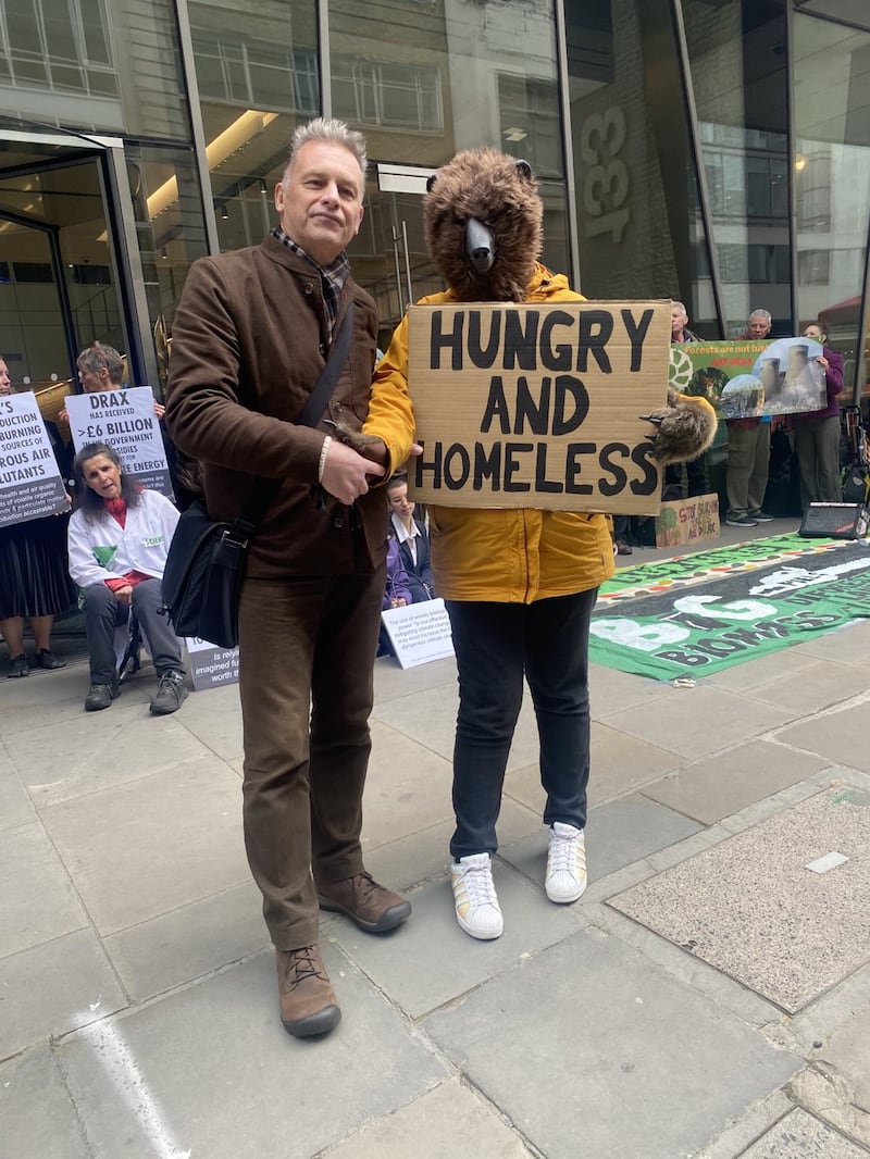 Chris Packham and members of the Axe Drax campaign group outside the Drax AGM in the City of London