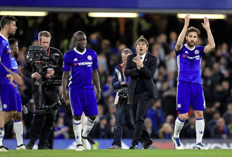 Chelsea manager Antonio Conte and players celebrate at full-time after their Emirates FA Cup quarter-final win over Manchester United at Stamford Bridge, London on Monday March 13, 2017. See 2016 On This Day