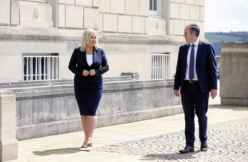 Paul Givan and Michelle O&#39;Neill outside Parliament Buildings, Stormont after they were nominated as First Minister and Deputy First Minister in 2021 